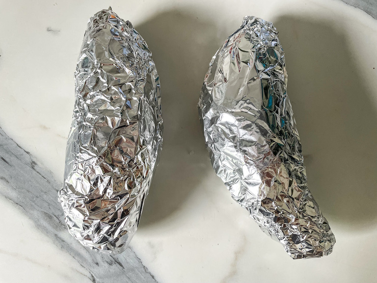 Sweet potatoes wrapped in foil