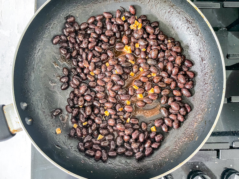 Black beans in frying pan