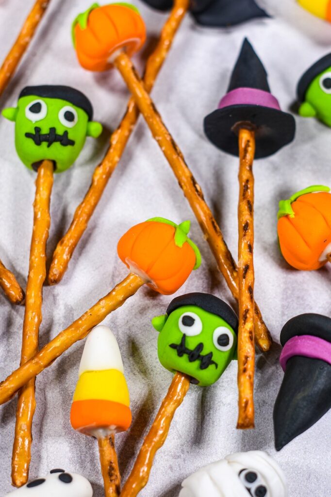 halloween pretzel sticks with fondant decorations