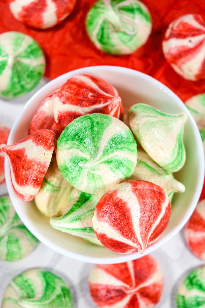 a bowl of peppermint meringue cookies