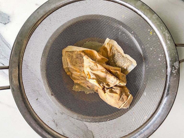 Tea bags in a mesh strainer