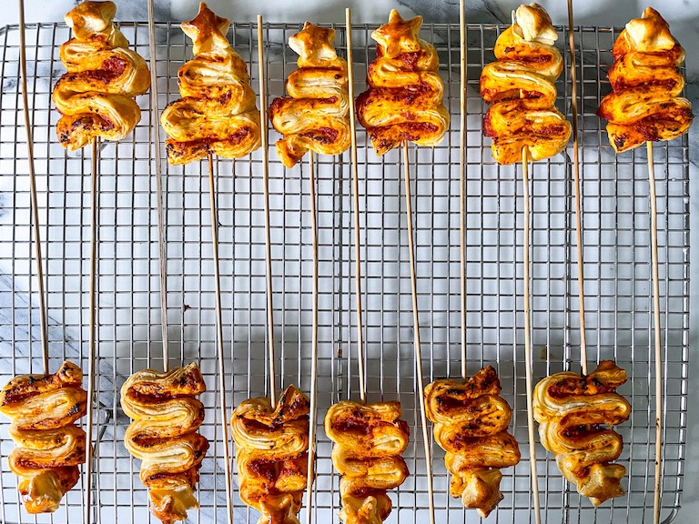 Puff pastry trees on a wire rack