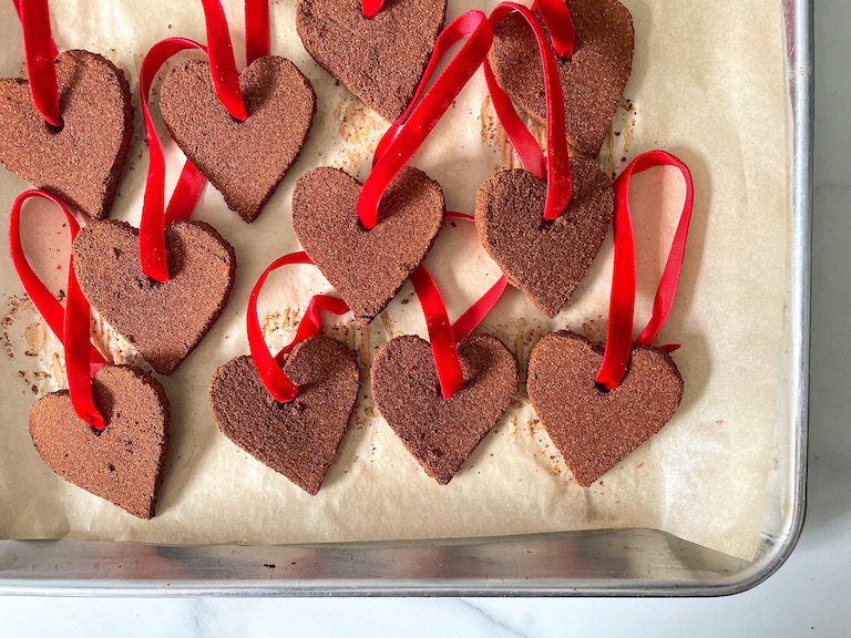 Heart ornaments with red ribbons