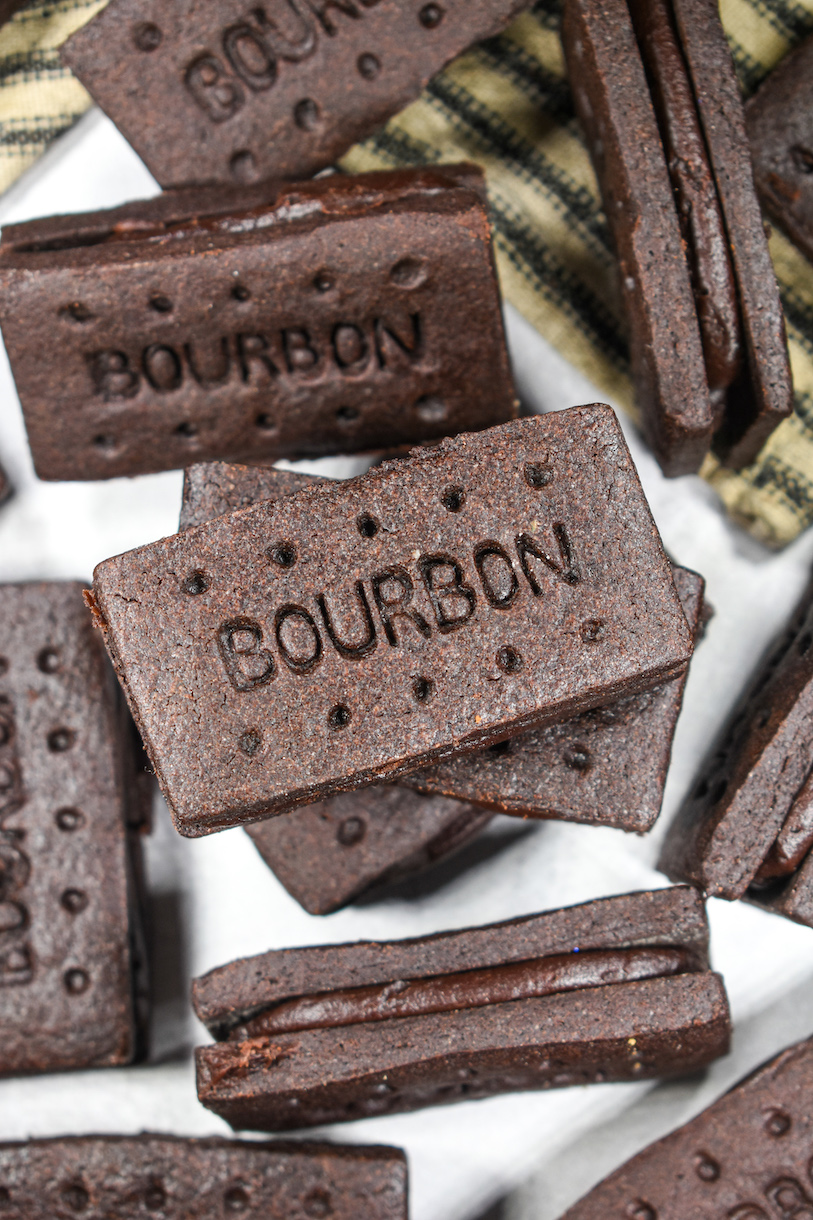 Homemade British bourbon biscuits on a white surface