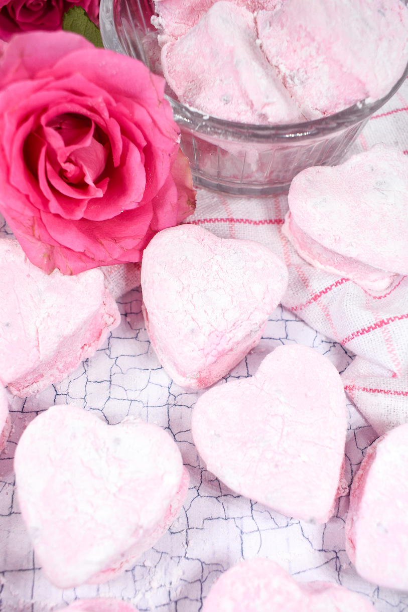 Rose marshmallows and a fresh pink rose