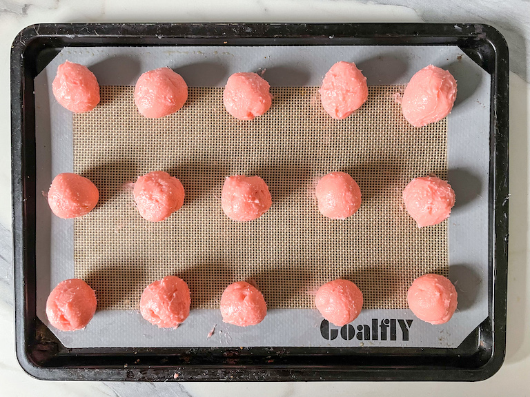 Rose truffles arranged on a tray