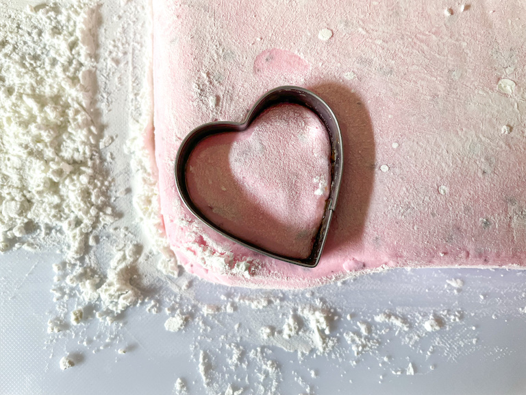 Heart cutter cutting rose marshmallows