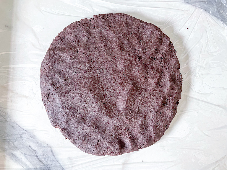 A disc of bourbon biscuit dough