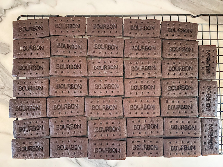 Bourbon biscuits on a wire rack