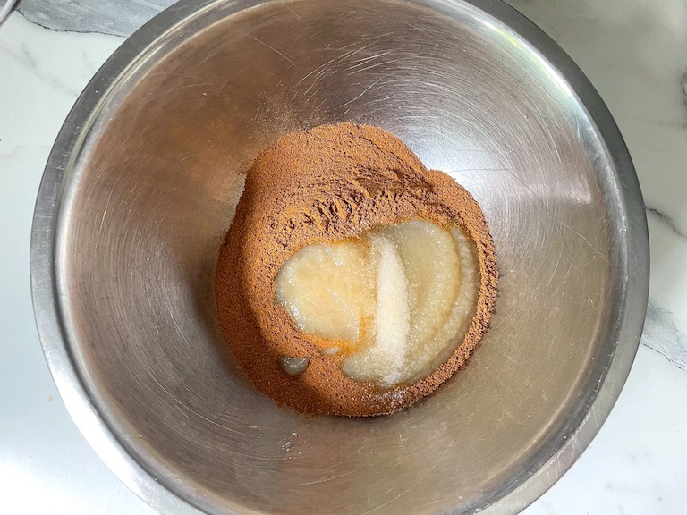 Applesauce and cinnamon in a bowl