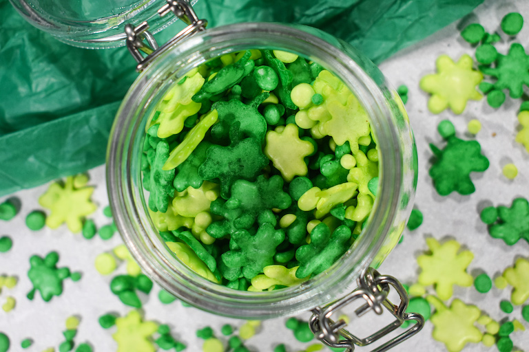 A jar of green sprinkles