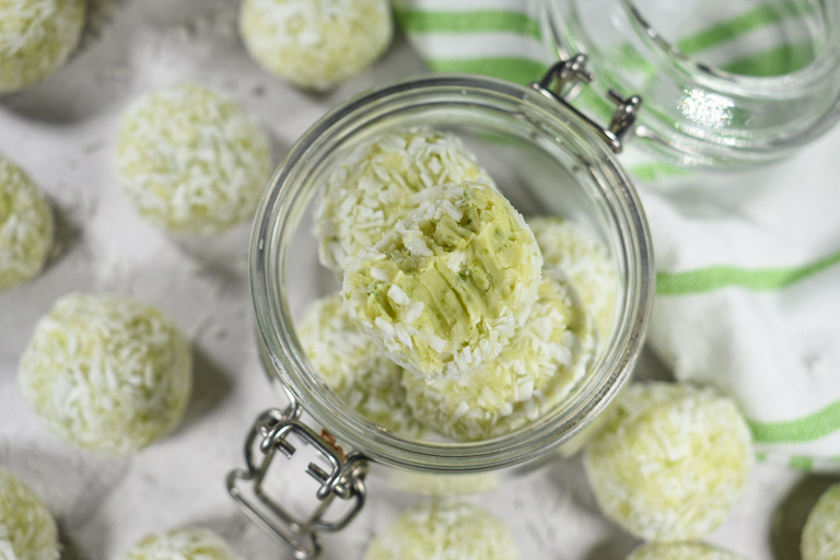 Looking down at a jar of coconut lime truffles