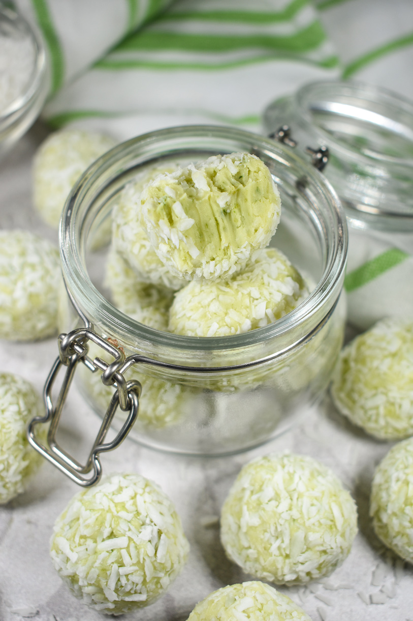 A half eaten lime truffle in a jar