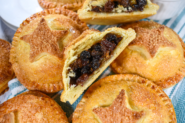 A sliced mincemeat hand pie showing the filling inside