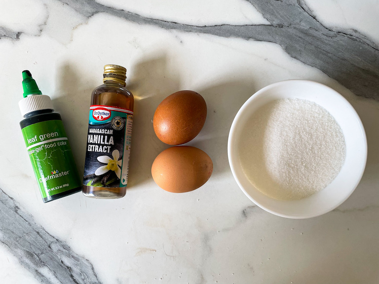 Ingredients for making meringue shamrock cookies