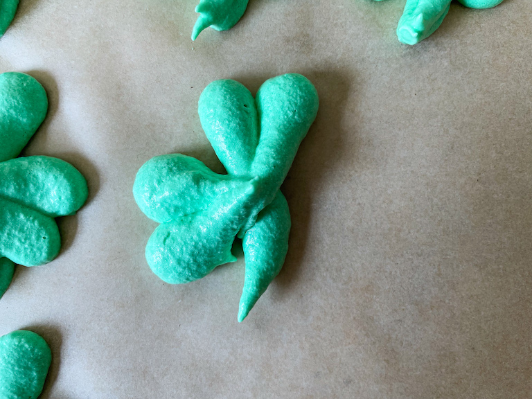 Showing how to pipe a shamrock shape