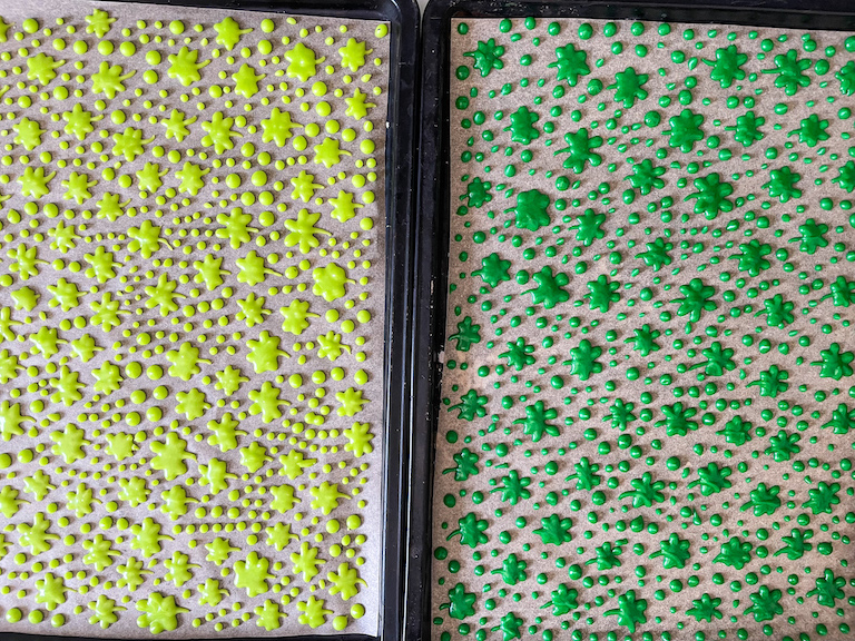 Two trays of piped shamrock sprinkles