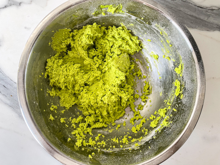 Bowl of green sugar cookie dough