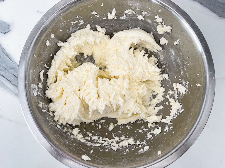 Bowl of white buttercream frosting