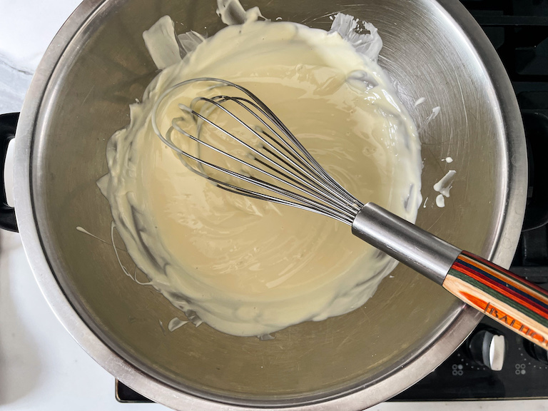 A bowl of melted white chocolate