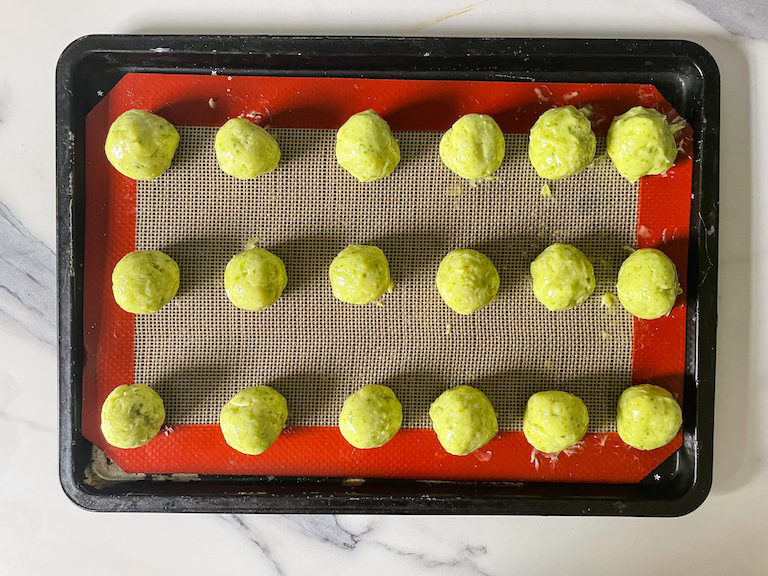 A tray of green truffles