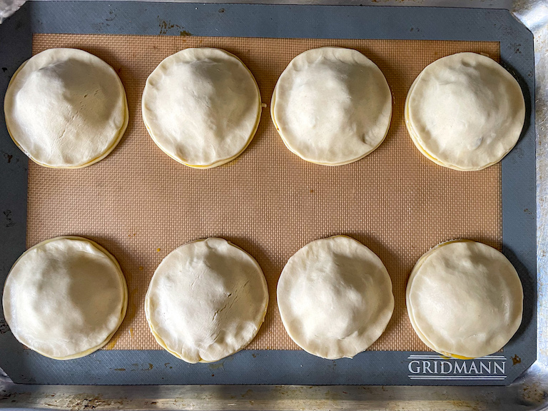 Shortcrust pastry hand pies before baking