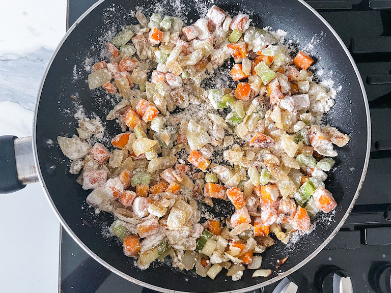 Flour stirred into vegetarian pot pie filling