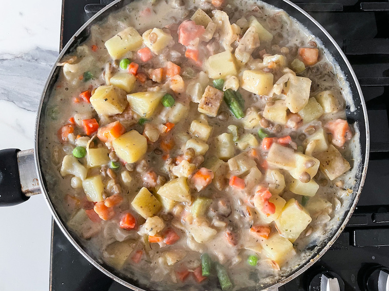 Vegetarian pot pie filling in a pan