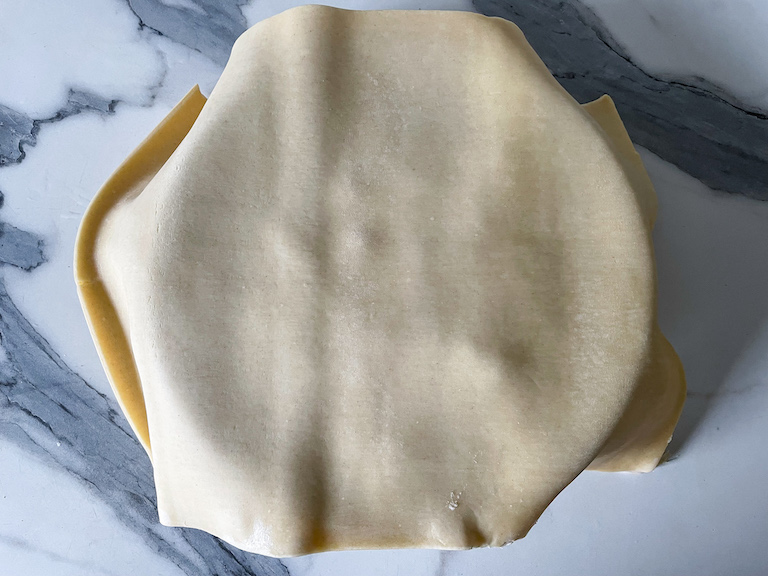 Sheet of pastry covering a pot pie dish