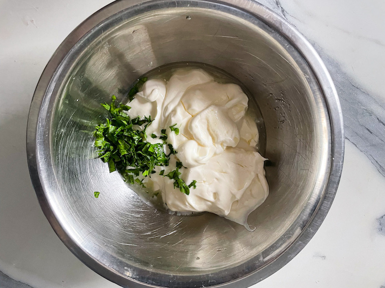 Blue cheese dip ingredients in a bowl