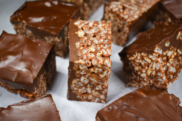 Nutella rice krispie treats on a white surface