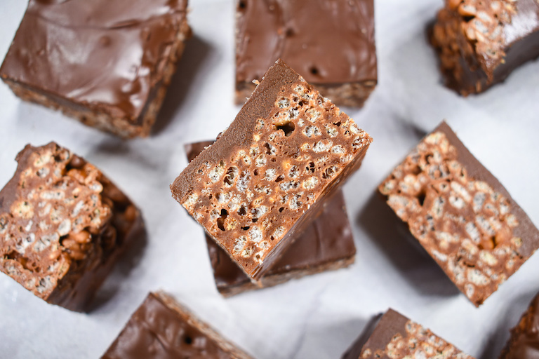 Nutella rice krispie squares on a white surface