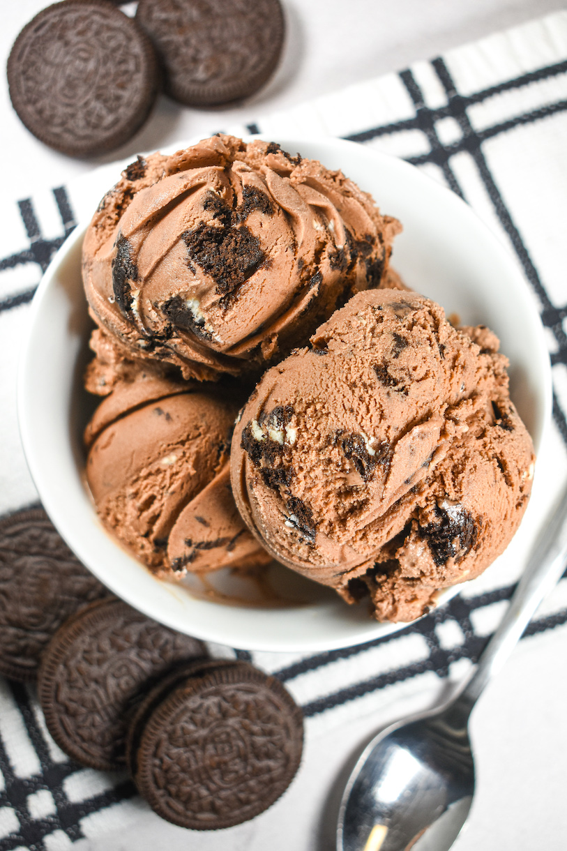 Oreo ice cream and cookies on a plaid tea towel