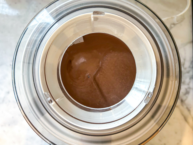 Chocolate ice cream base in an ice cream maker