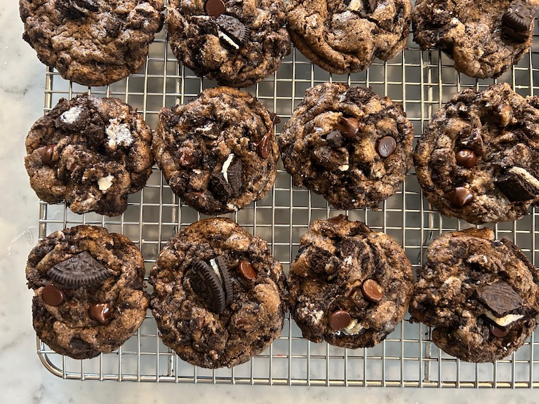 Chocolate chip Oreo cookies on a wire rack