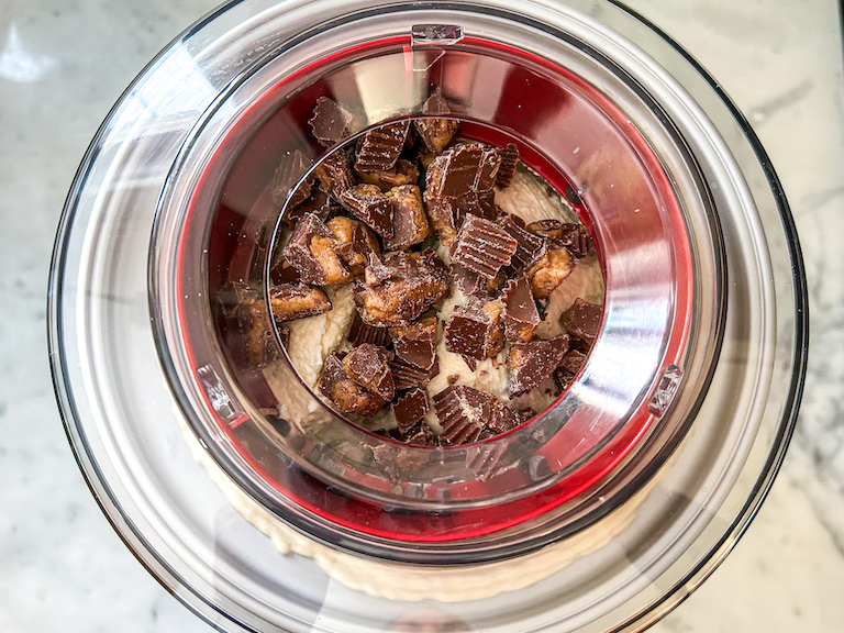 Peanut butter cup ice cream churning in an ice cream maker