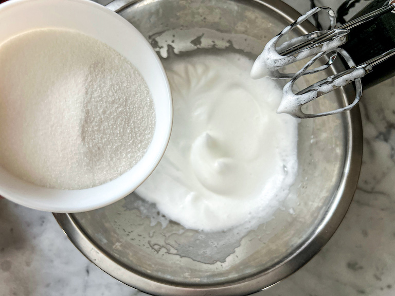 Adding sugar to whipped egg whites