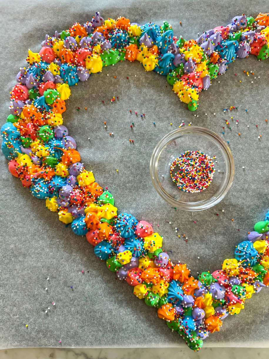 Heart shaped wreath made of piped meringue kisses