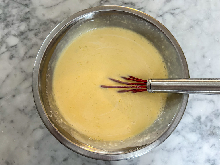 A bowl of mango ice cream base, before churning