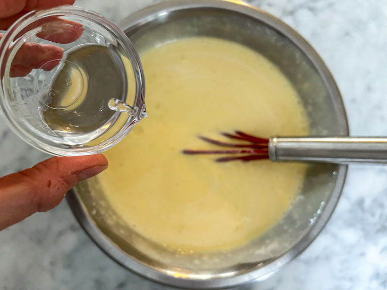 Adding vodka to mango ice cream base