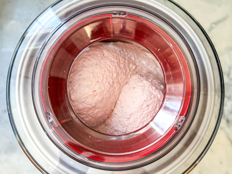 ice cream maker churning homemade strawberry ice cream