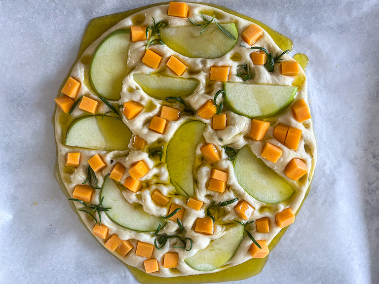 Cheese and apple focaccia before baking