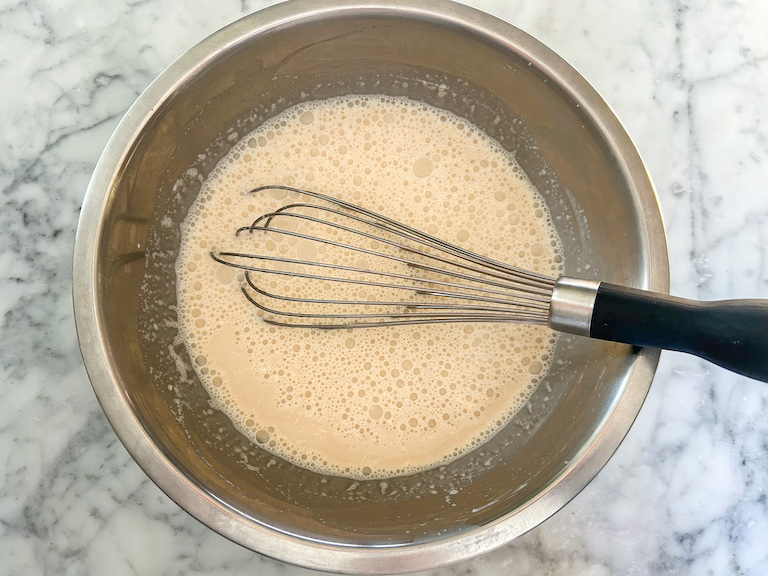 Whisking maple syrup into ice cream base