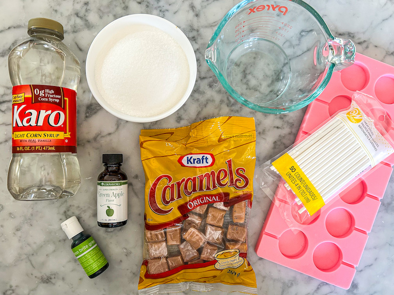 Ingredients for making caramel apple lollipops