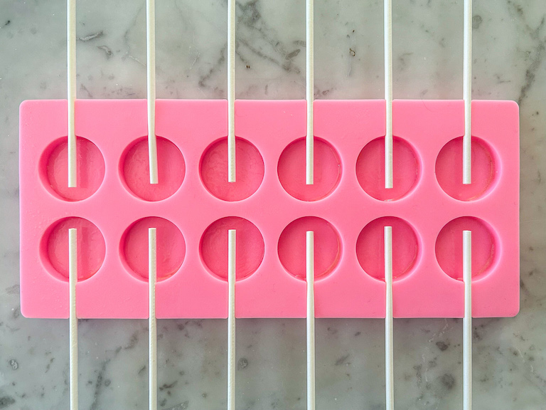 pink silicone lollipop mould with sticks