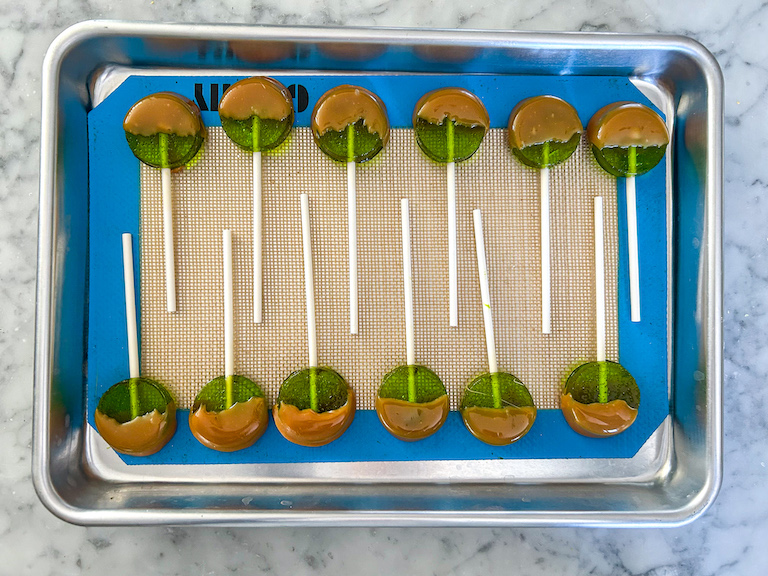 Tray with caramel apple lollipops