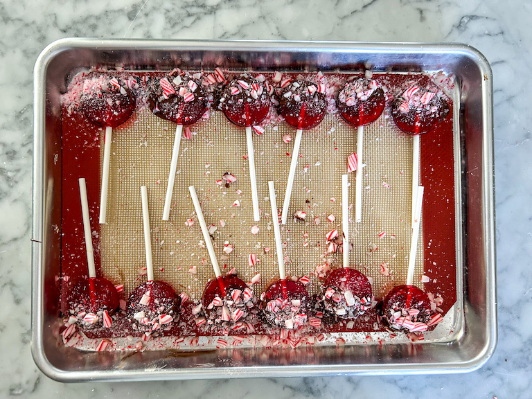 Peppermint lollipops on a small tray