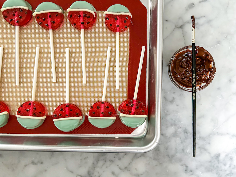 Decorating watermelon lollipops