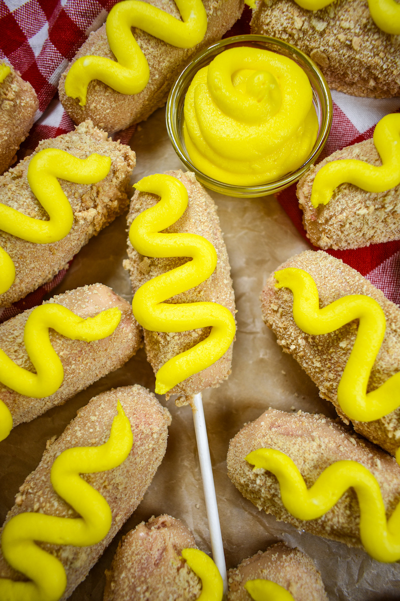 corn dog cake pops with buttercream mustard