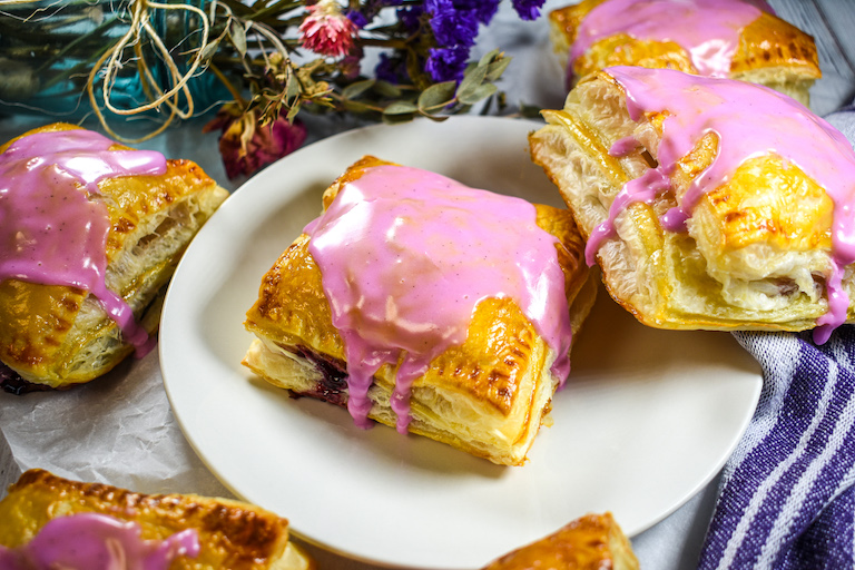 Mixed berry hand pies on a plate